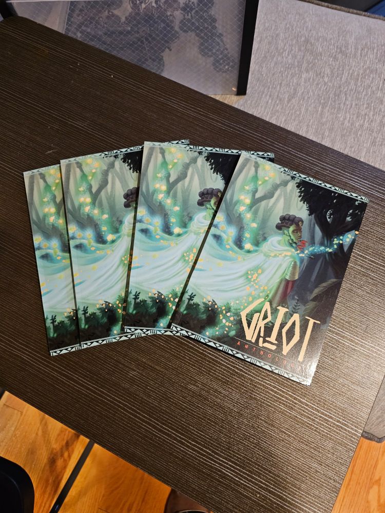 Printed copies of the Griot Anthology rpg book