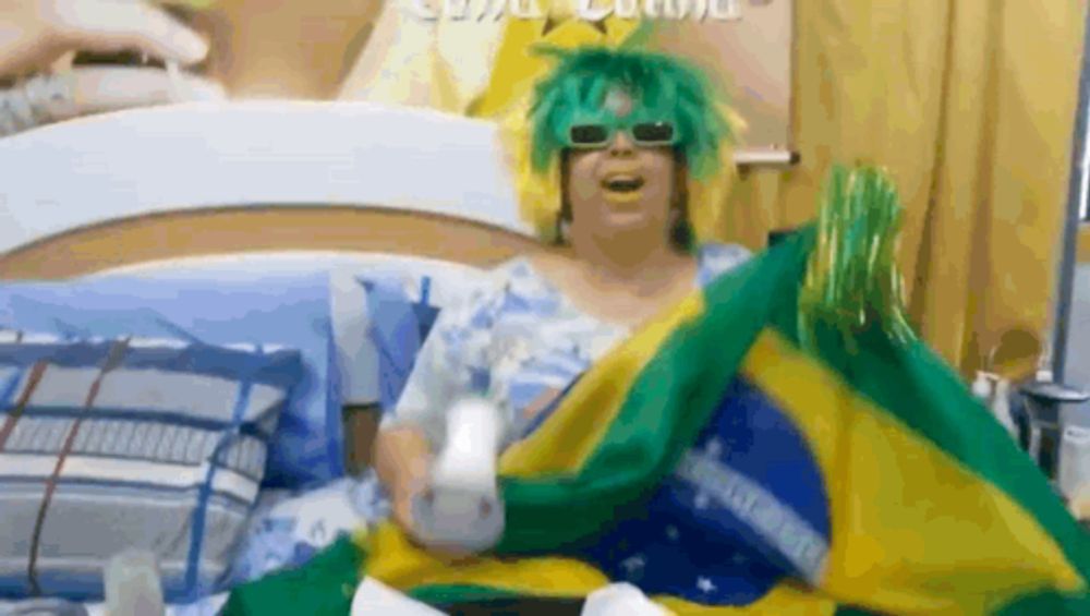 a woman in a green wig and sunglasses is holding a brazilian flag