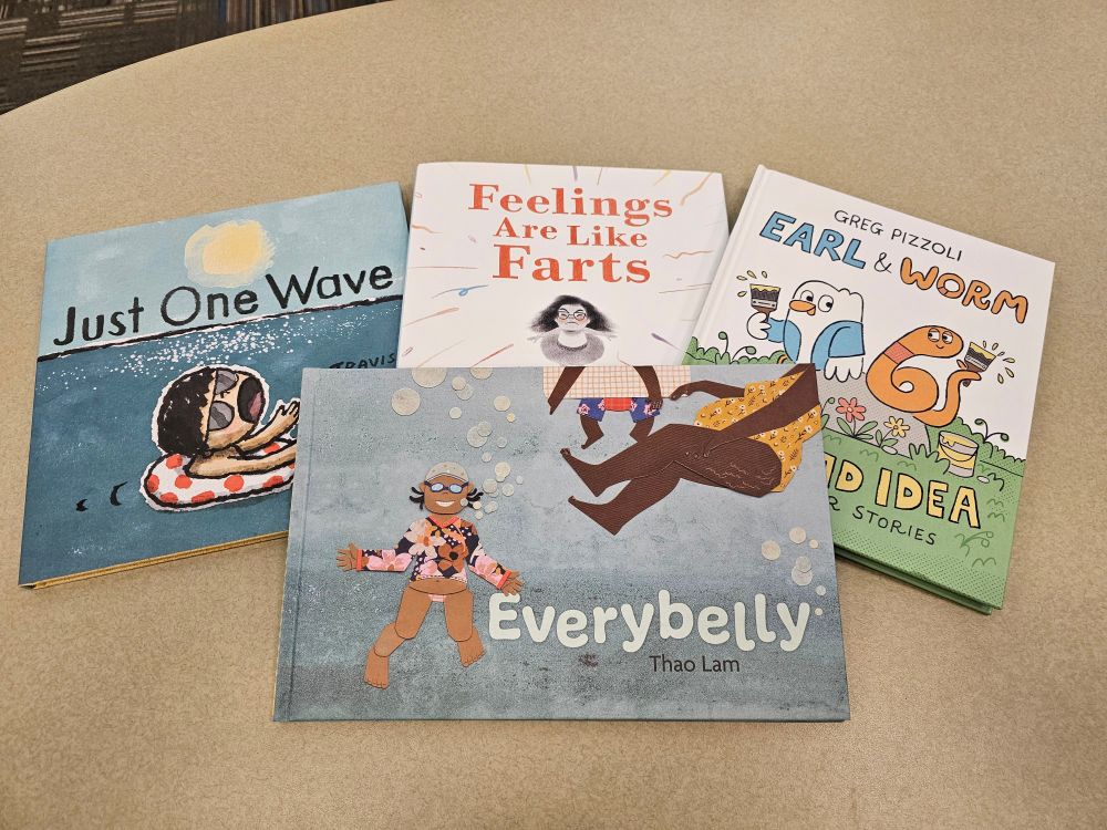 4 books spread on a table:
Just One Wave by Travis Jonker
Feelings Are Like Farts by Christopher Willard & Tara Wosiski
Earl & Worm by Greg Pizzoli
Everybody by Thao Lam
