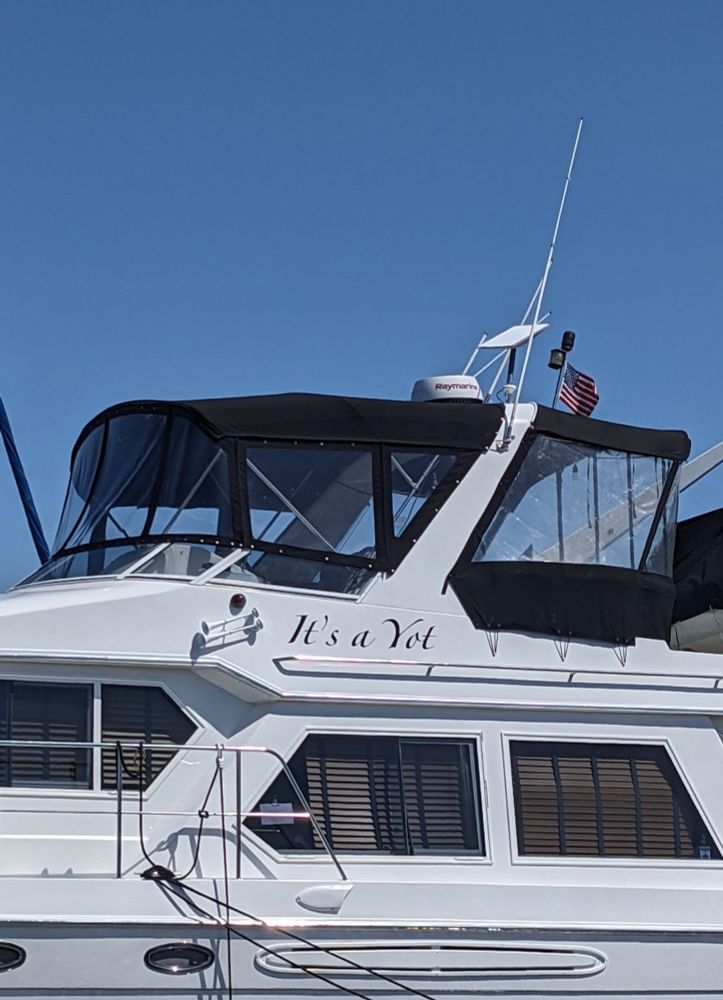 A motor boat named It's a Yot.