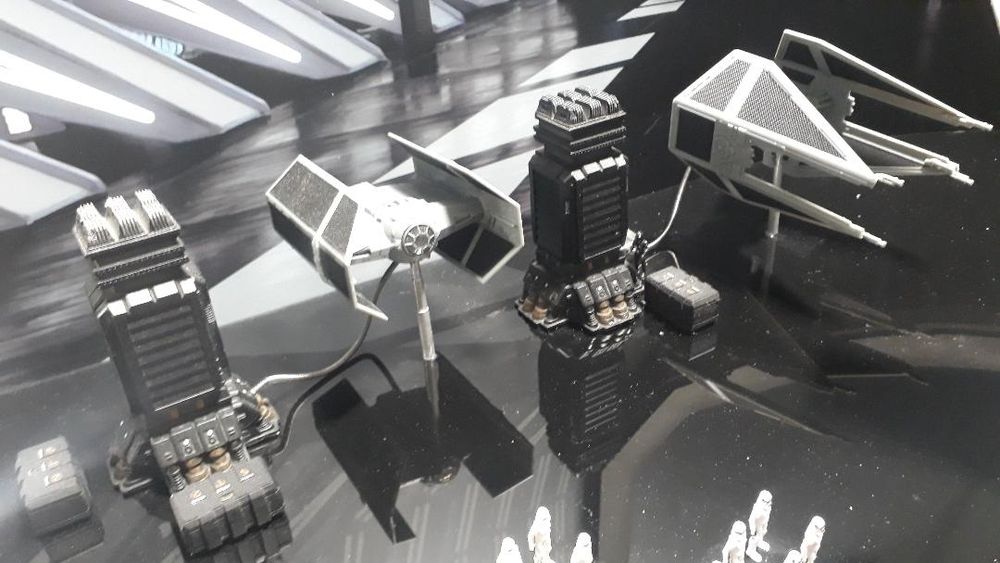a close-up of some of the toys in the scene, also showing some of the scenic resin pieces from Fenris Games that were used to 'populate; the area.