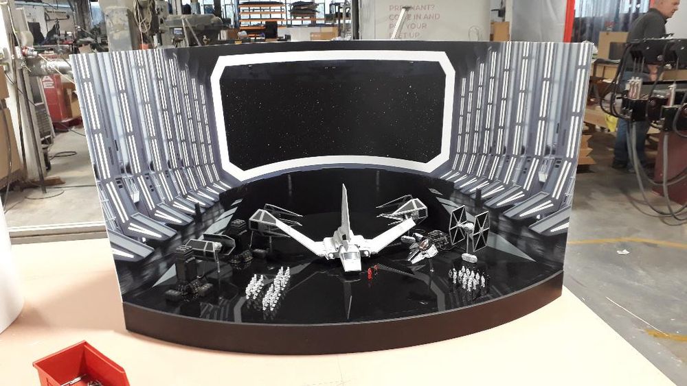 a model I built showing a scene from the Death Star in Star Wars, using several toy vehicles and figures.