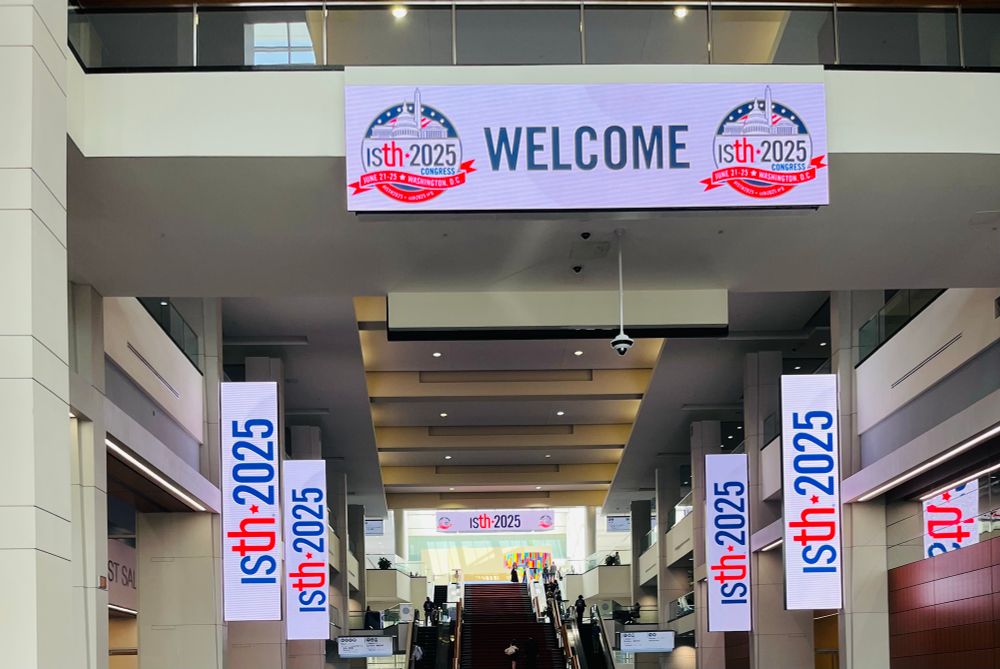 Banners (in a long hall) saying Welcome ISTH 2025 and ISTH 2025