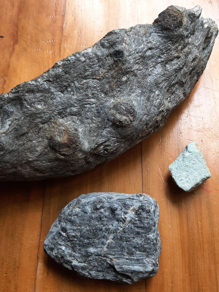 Sparkly grey schist with big deep red garnets. Sparkly green chrome mica. Smaller schist, with smaller deep red garnets and lots of glittery mica.