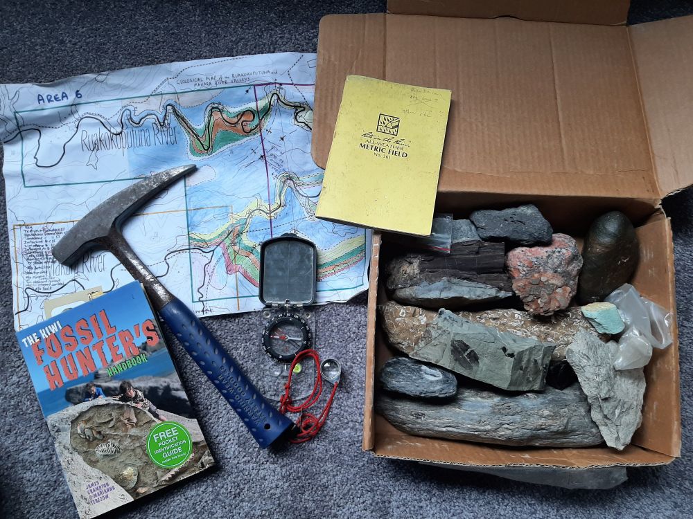 Box of rock samples and geology field kit. More detailed descriptions in alt text of subsequent photos.