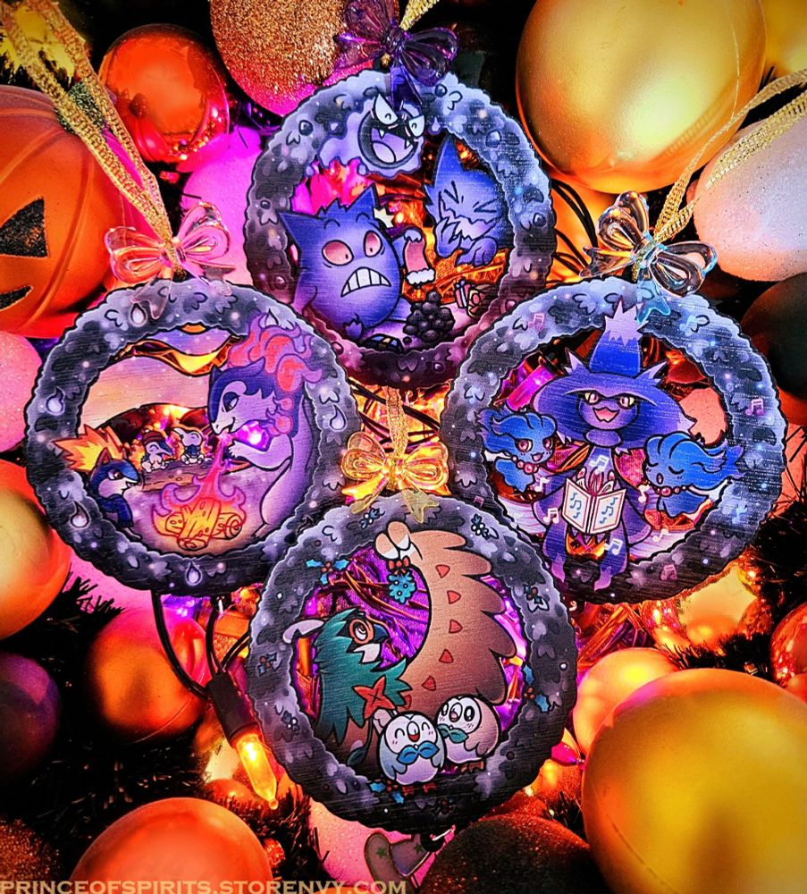 A set of four wooden Pokémon holiday ornaments featuring Gengar, Haunter, & Gastly with a stocking full of coal, Hisuian Typhlosion, Quilava, and 2 Cyndaquil around a campfire, A Mismagius with two Misdreavus singing carols, & a Decidueye holding up mistletoe over two Rowlet sweethearts.
