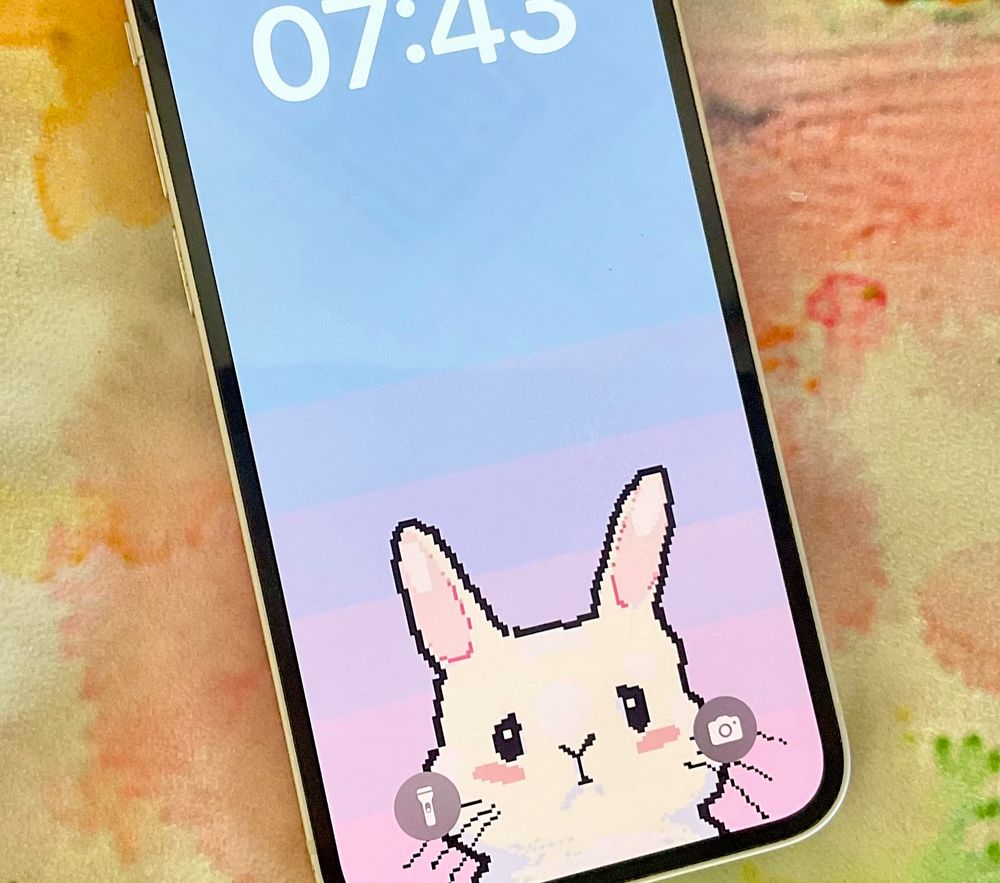 bunny on pink and blue background. pixel art