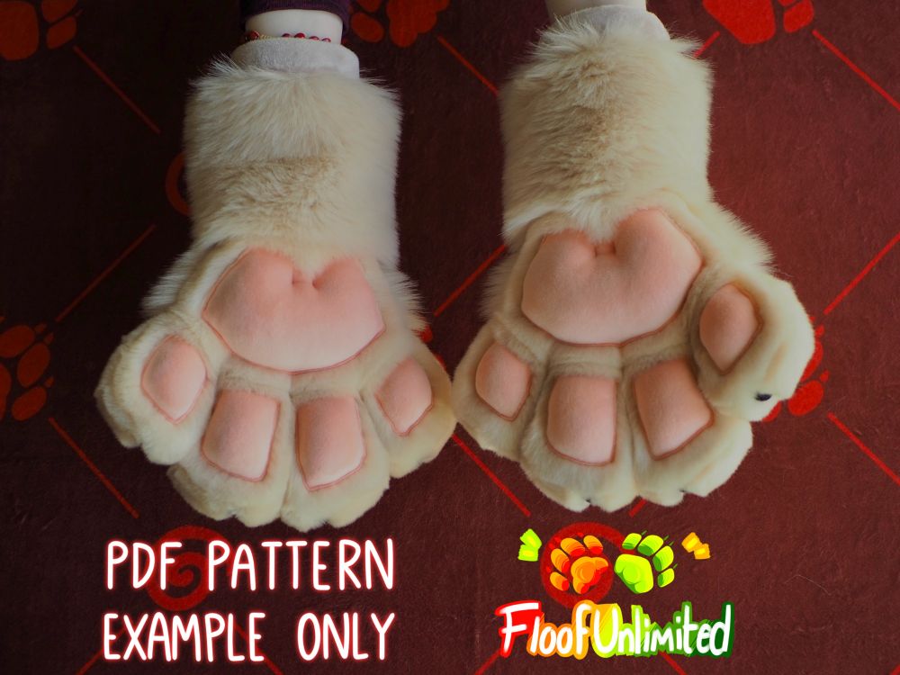 Tan fursuit cat paws with pink square beans and nubby black claws being modeled. Floof Unlimited logo and text that reads “PDF pattern”, “example only”