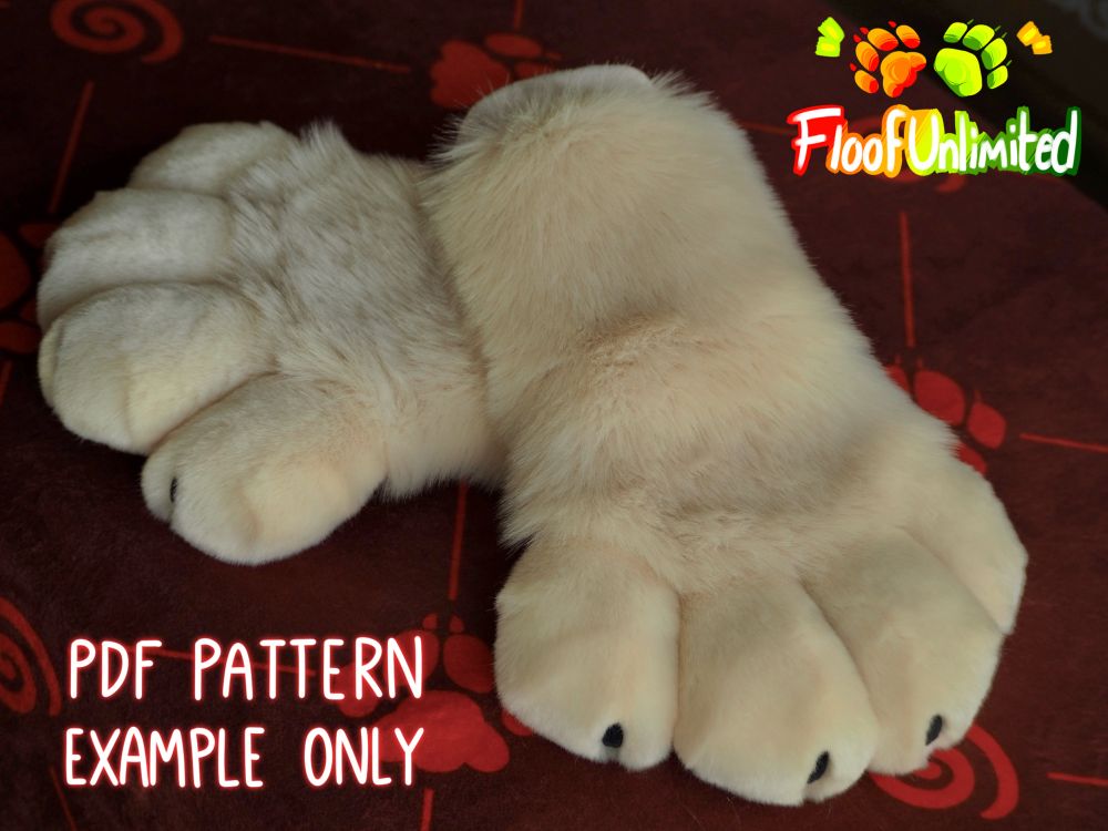Tan fursuit cat paws with pink square beans and nubby black claws resting on a patterned table cloth. Floof Unlimited logo and text that reads “PDF pattern”, “example only”