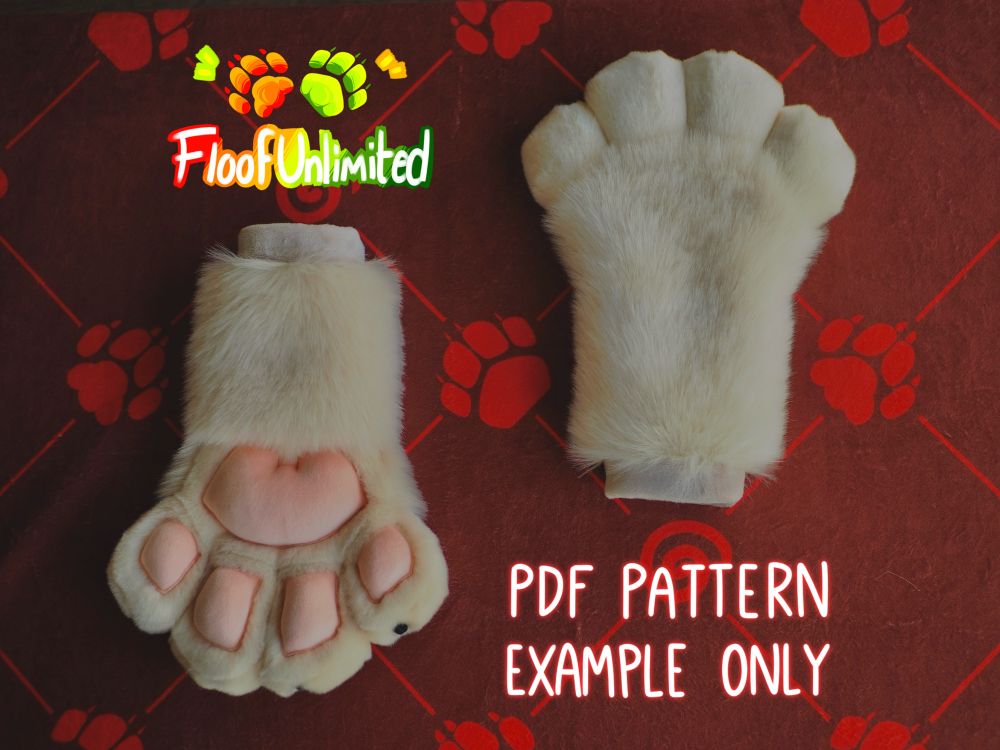 Tan fursuit cat paws with pink square beans and nubby black claws resting on a patterned table cloth. Floof Unlimited logo and text that reads “PDF pattern”, “example only”