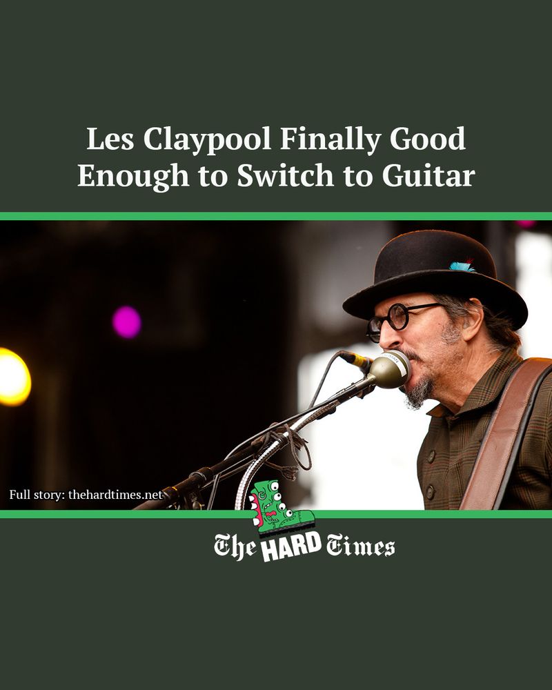 Cover of the HardTimes saying "Les Claypool finally Good Enough to Switch to Guitar" above a photo of Les Claypool of Primus, which is above a lower 1/3 with the Hard Times green boot logo and names. 