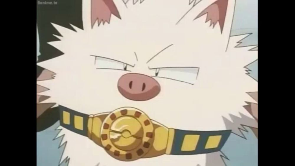 a close up of a cartoon character wearing a belt and a watch .