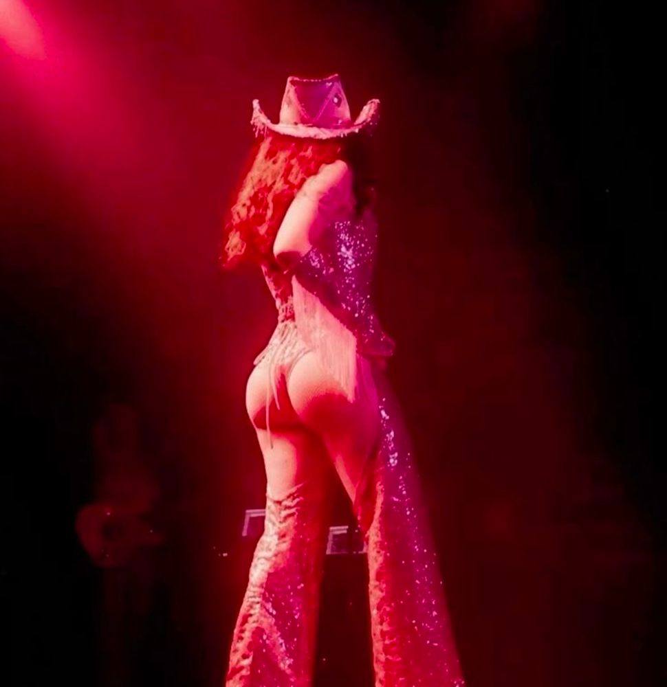 Chappell roan in pink cowgirl outfit 
