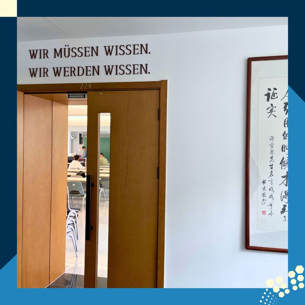 A german quote "We must know, we will know" above the door to a lecture hall at PKU