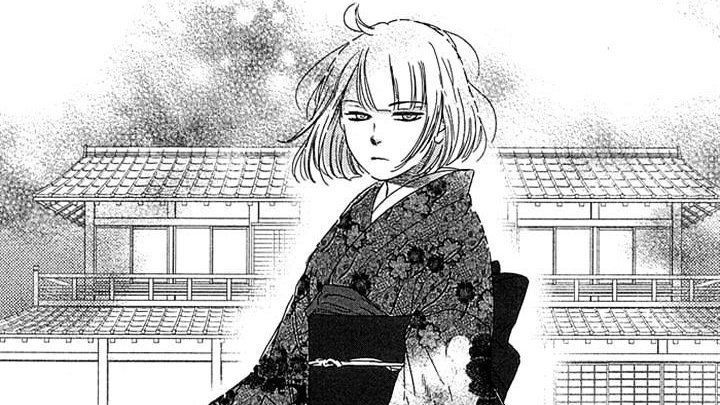 propriétaire de l'auberge dans Usemono Yado. Elle se tient au centre et regarde en face d'elle, avec des cheveux courts clairs et un kimono à fleur. L'auberge avec un étage se trouve derrière elle dans un style architectural japonais. Elle a une expression vague et distante.