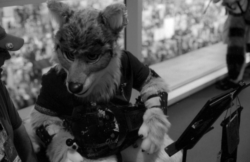 Orion wulfe playing the hurdy-gurdy, black and white