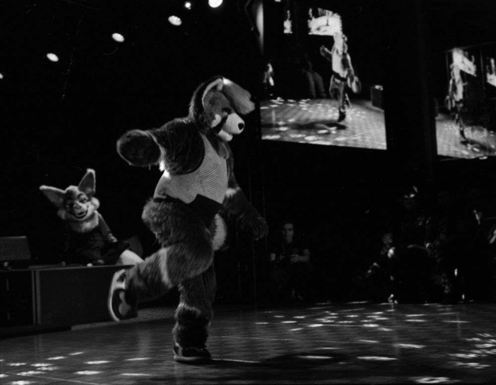 Black and white photo of Scooter dancing, on one foot