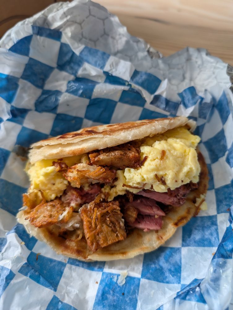 Pastrami, egg, cheese & latke on a flatbread, from Edith's Sandwich Counter