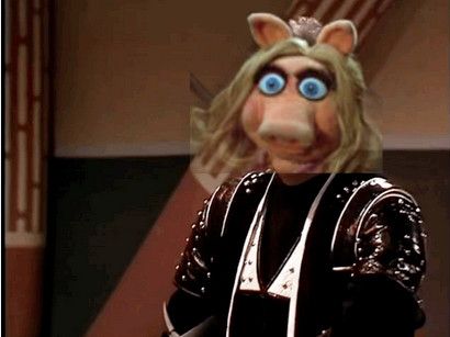 Miss Piggy as Avon shooting Blake