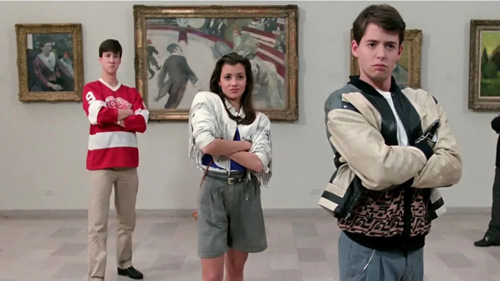 A scene from the film “Ferris Bueller’s Day Off” of three characters standing at the Art Institute of Chicago 