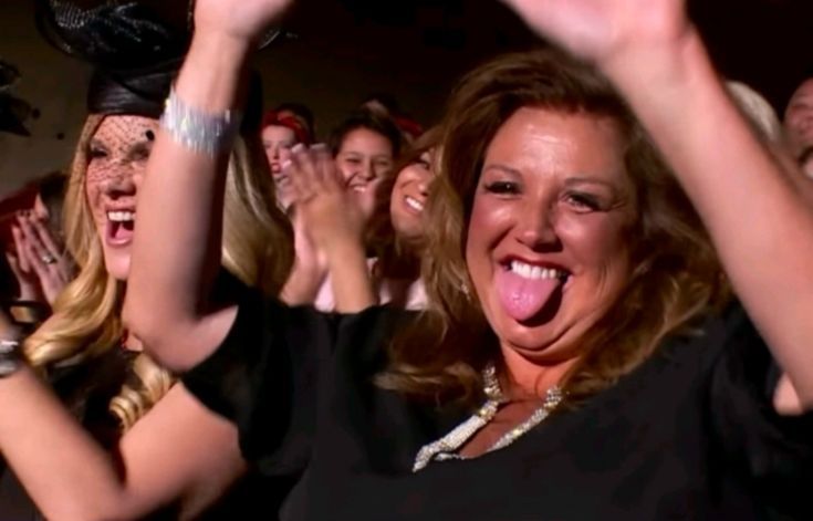 Amber Lee with her tongue out and getting lit as freak