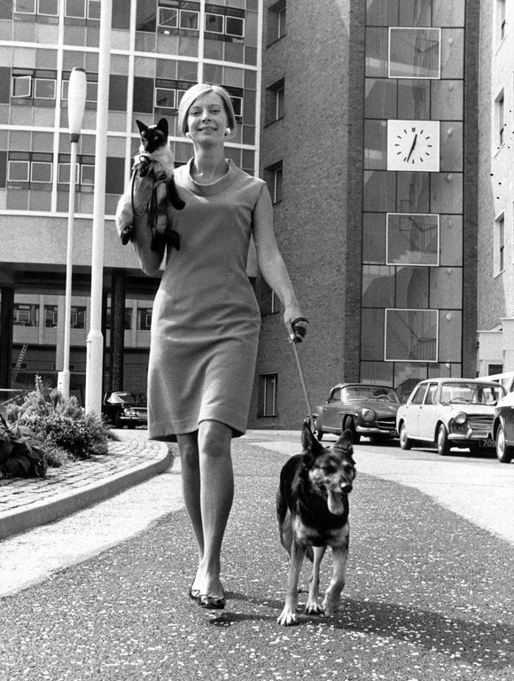 Biddy Baxter with a cat and a dog outside BBC HQ, late 60s I guess.