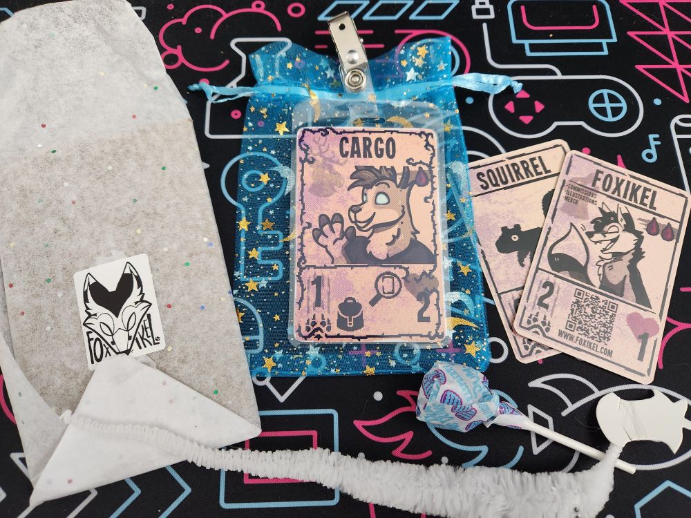 An Inscryption style card of Cargo the llama along with various treats and trinkets. The card was commissioned from Foxikel.