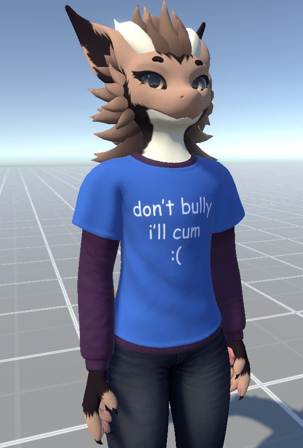A nardoragon wearing a blue shirt over a purple sweater. The shirt reads “don’t bully I’ll cum :(“