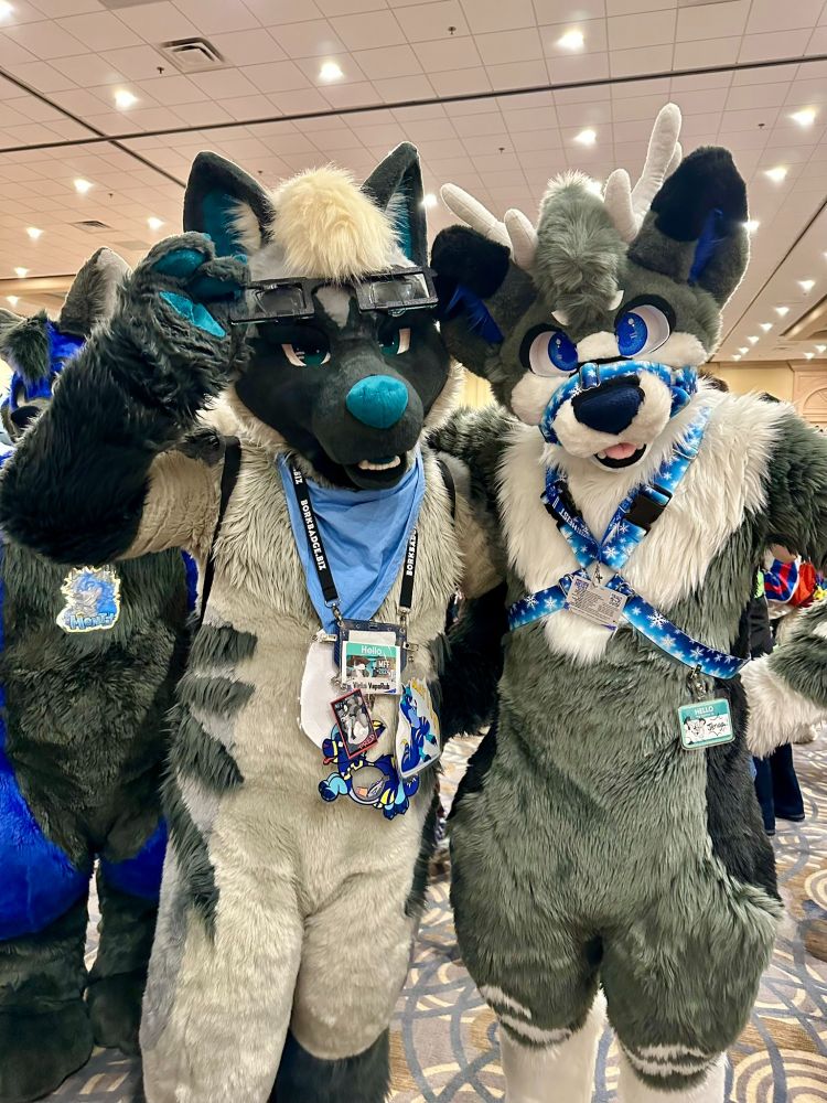 Fursuit photo of Vick with Jenga.