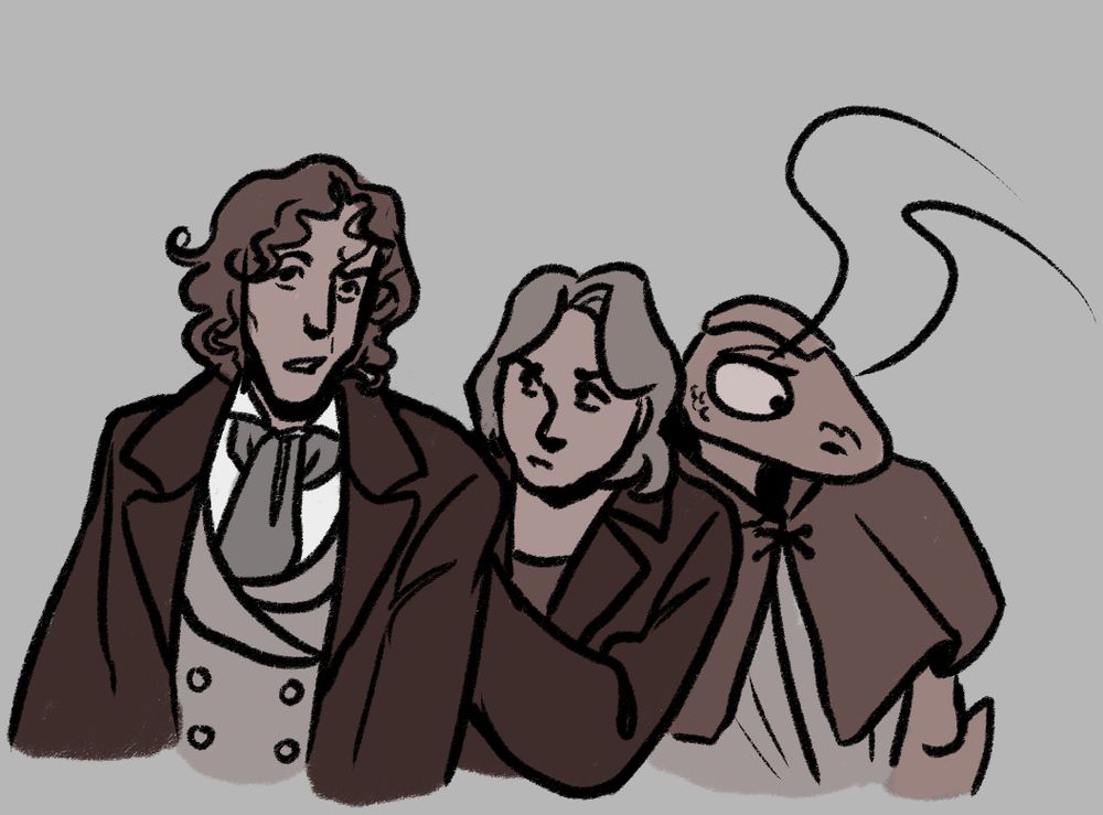 The 8th doctor, charley and C'rizz standing close together and looking around