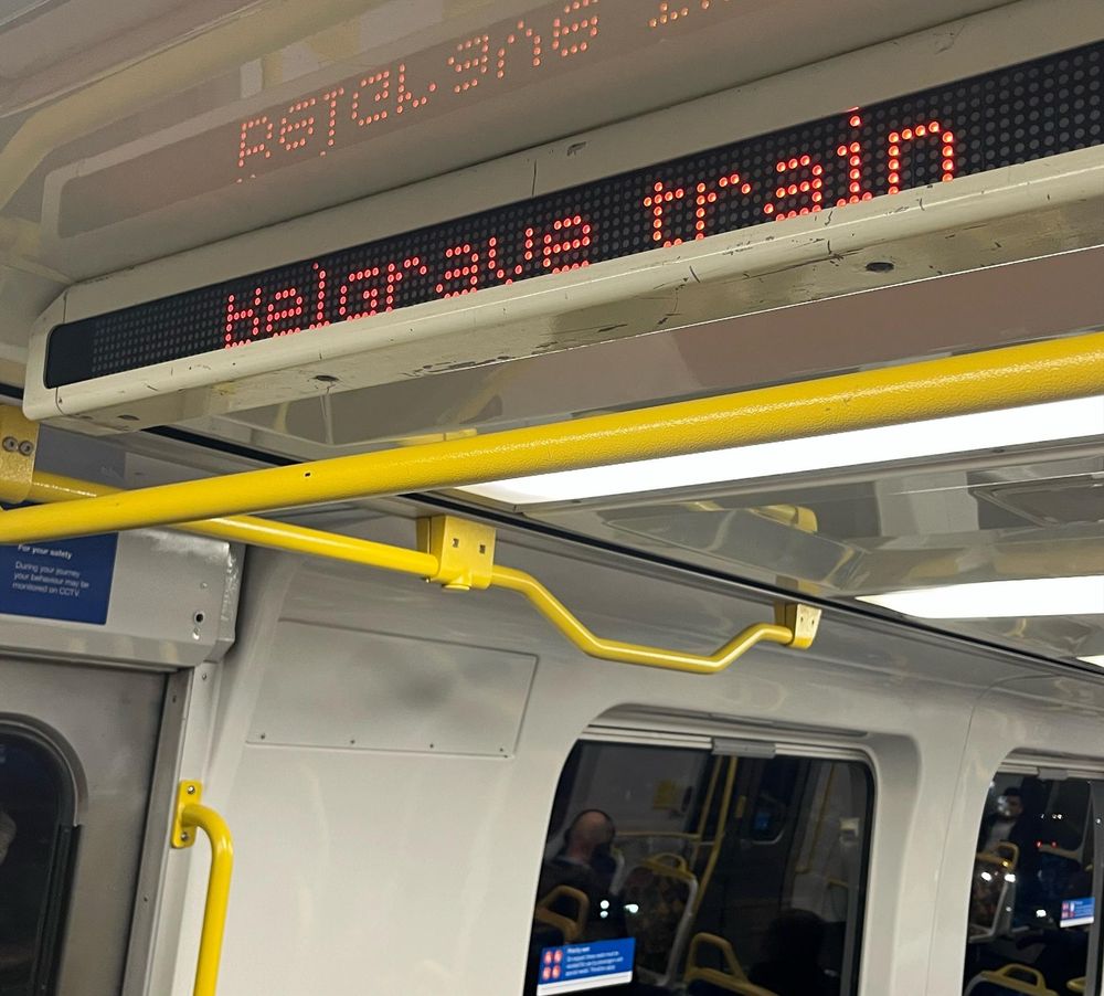 Interior train sign saying Belgrave Train