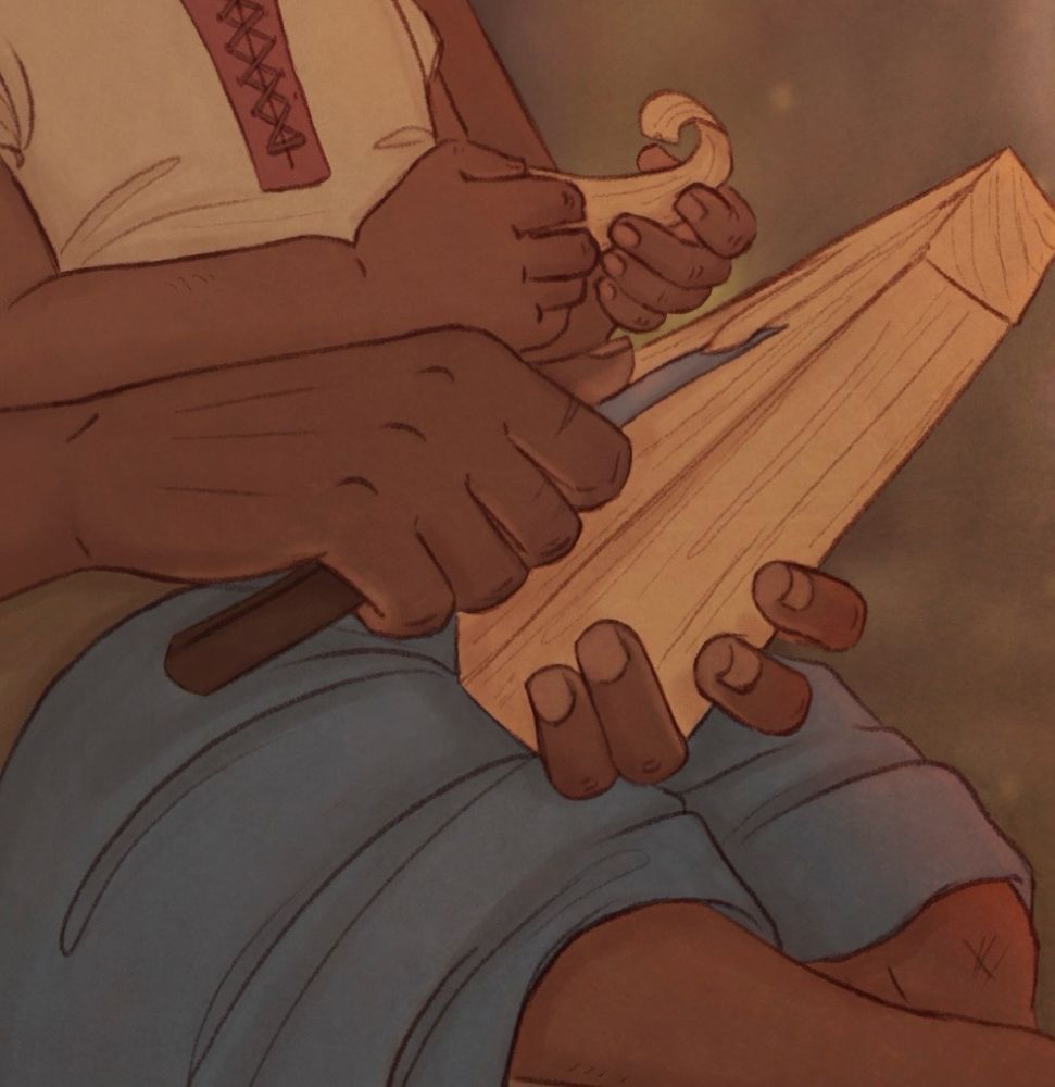 A close up of an image. It shows two pairs of hands, little Davrin and his mother’s. He’s sitting on his mother’s lap as she is showing him how to whittle.