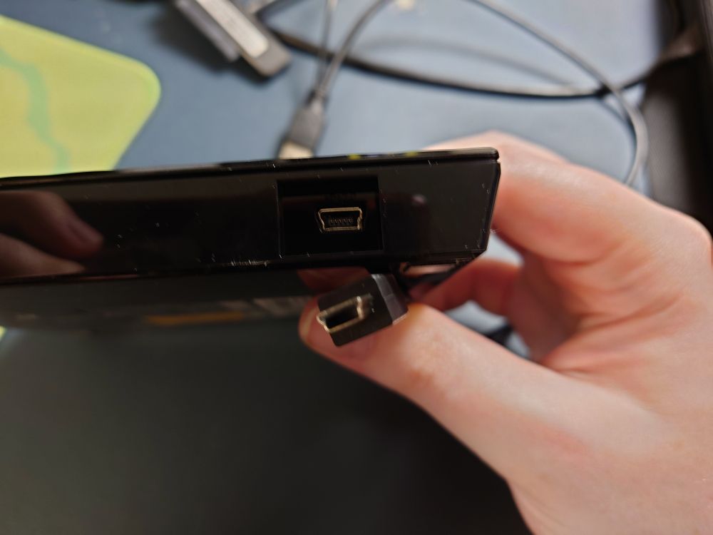 The back of my new external DVD drive, with a mini-USB connector, and the matching end of the cable it came with