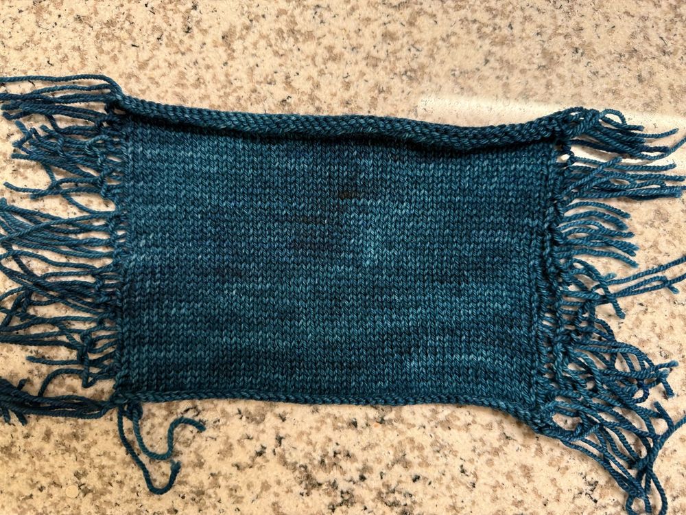 Swatch of hand knitting 