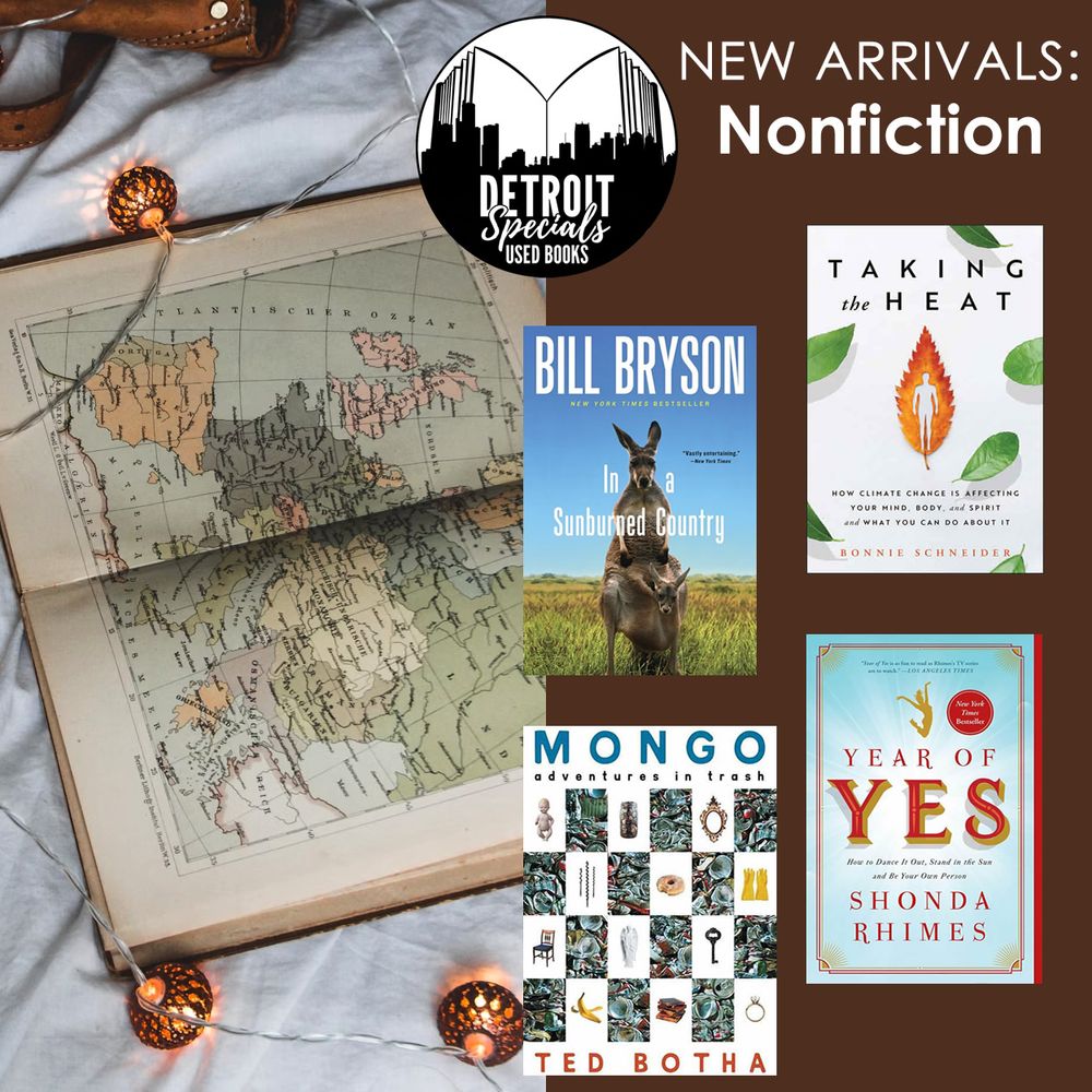 Promotional graphic. The Detroit Specials logo is at the top center. Header text reads: NEW ARRIVALS: Nonfiction. 

The left side of the graphic is a photo of a large book opened to a colorful, two-page map. The book is surrounded by small lights and part of a messenger bag is visible in the upper left-hand corner. The right side of the image shows four book covers: In a Sunburned Country, Mongo: Adventures in Trash, Taking the Heat, and Year of YES.