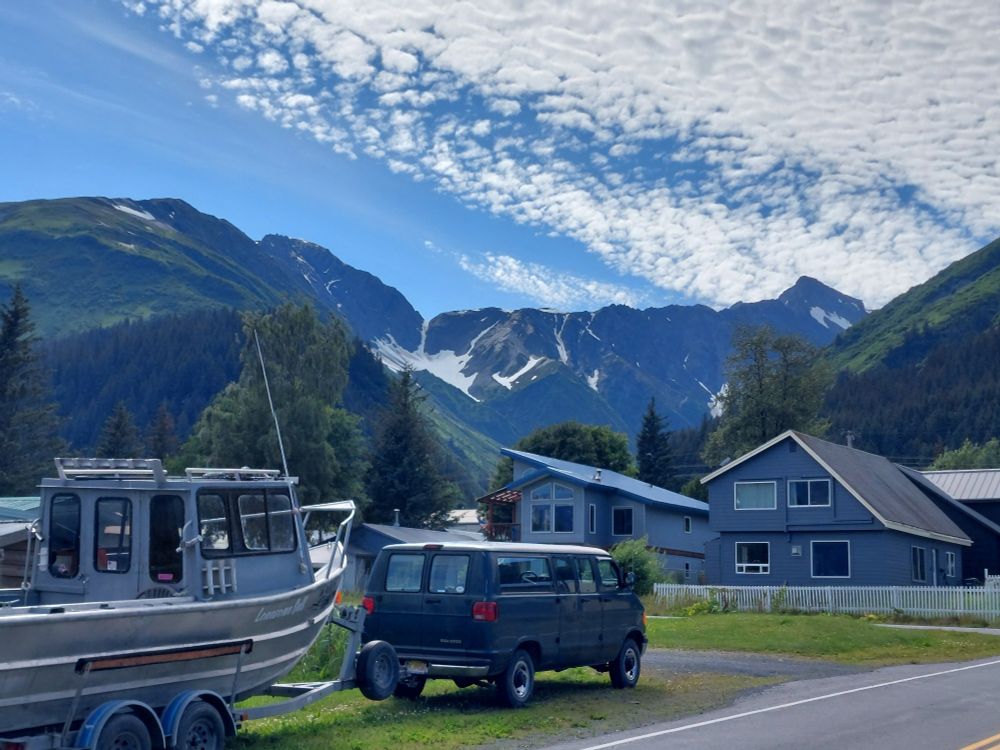 View of Seward houses and streets against the backdrop  of surrounding mountains.