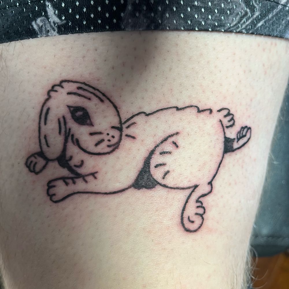 A rabbit tattoo done in tradition style