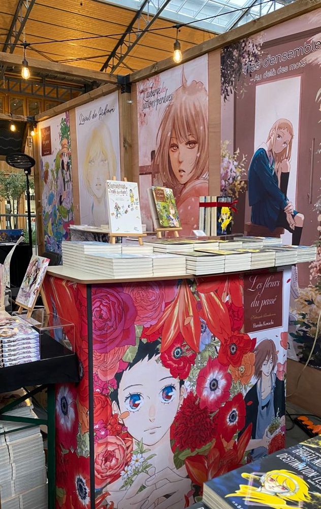 Photos du stand des éditions naBan à la Foire du Livre de Bruxelles dans la Gare maritime Tour & Taxis