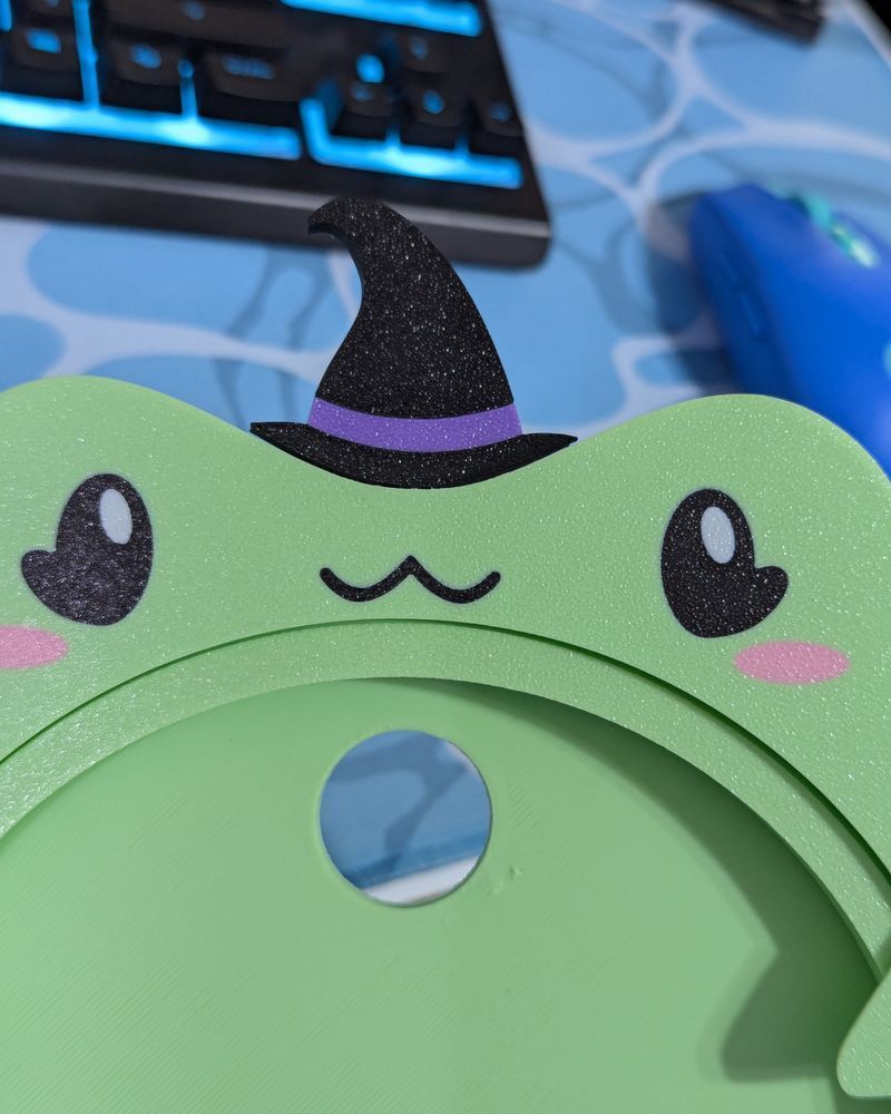 frog embroidery hoop with witchy hat
