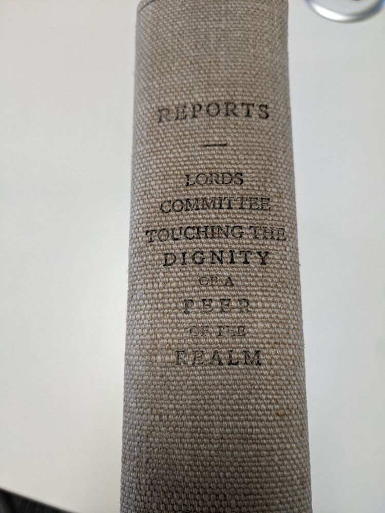 Photo of the spine of a large old book eith a grey-brown woven cover

REPORTS - LORDS COMMITTEE TOUCHING THE DIGNITY OF A PEER OF THE REALM