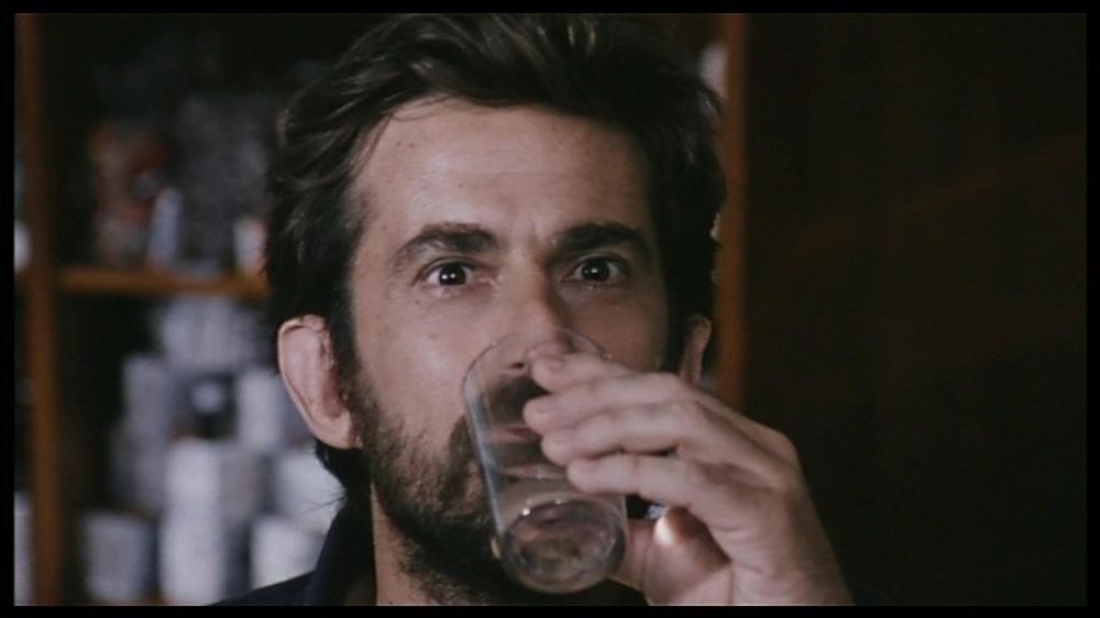 Nanni Moretti enjoying his customary glass of water before breakfast in CARO DIARIO [1993]