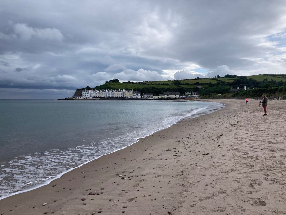 Colin stading on Cushendun beach
