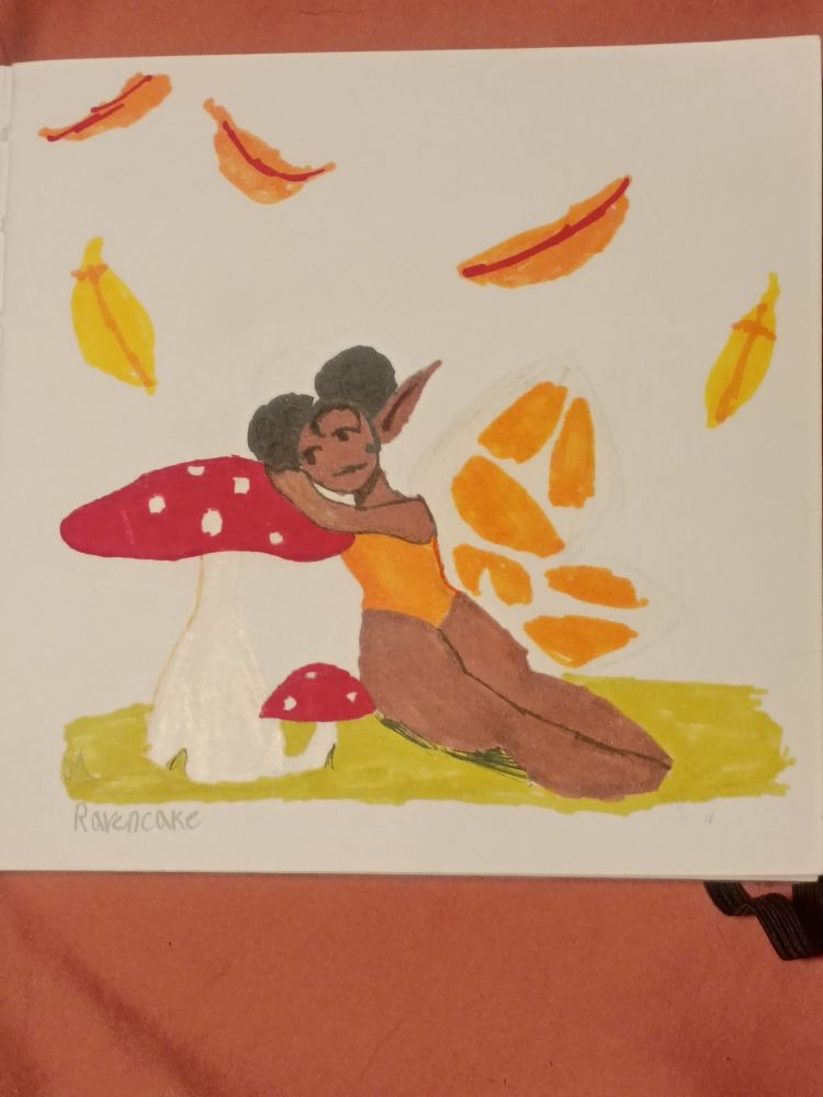 A fairy laying on a mushroom 