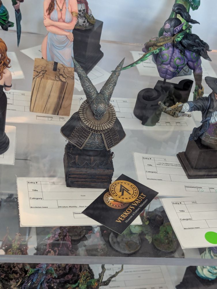 Trench Crusade bust with Verko's Vault award.
