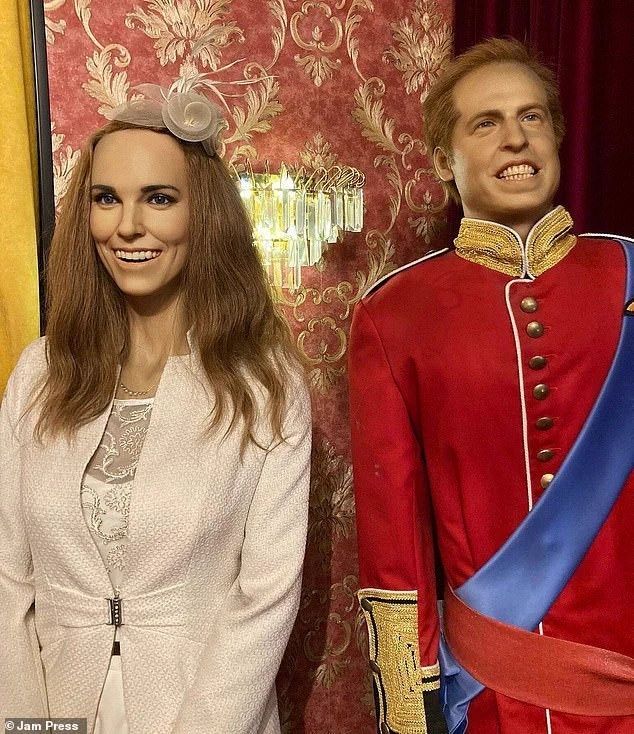 Prince William and wife Catherine wax sculptures. They look fucking demented mate, couple of bloody lunatics standing like giggly pod people. Or pot people lol. They look high and inhuman and trying to maintain