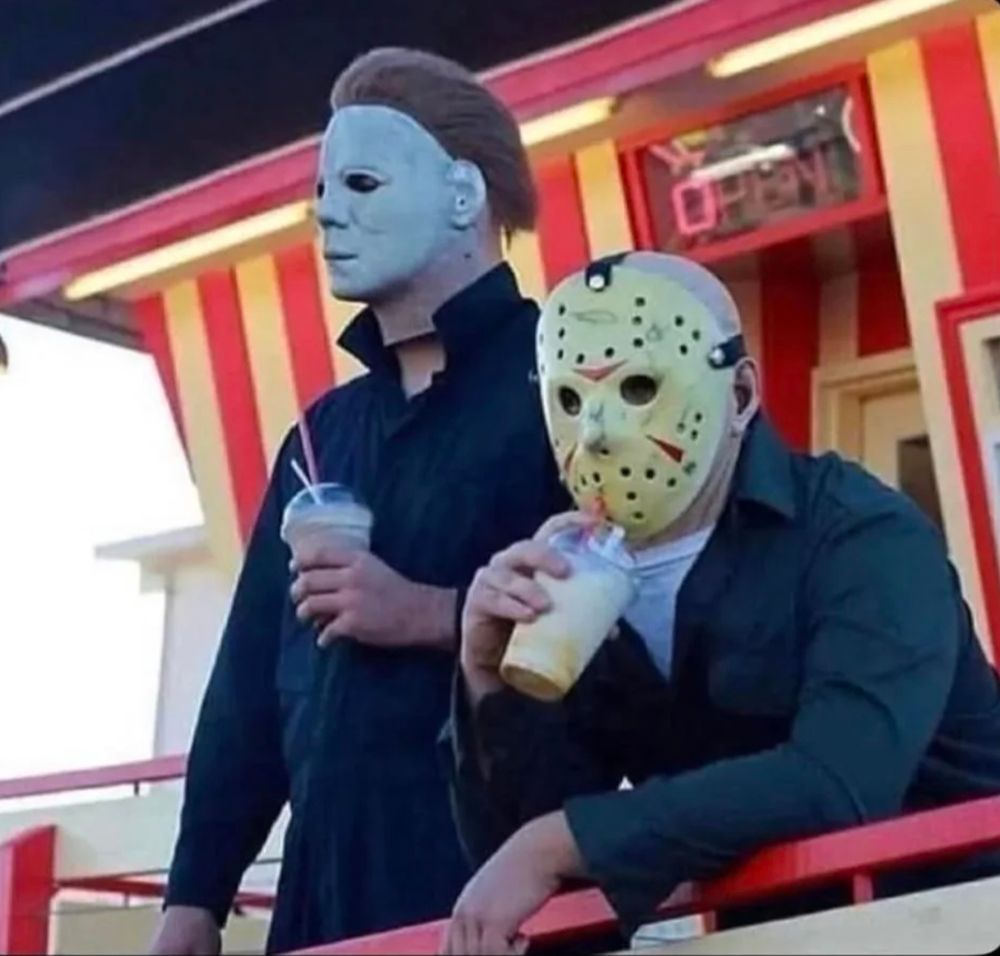 A picture I saw once of Jason and Michael the two masked serial killer dudes from the scary movies (different scary movies) enjoying a milkshake and looking bored at a carnival booth.