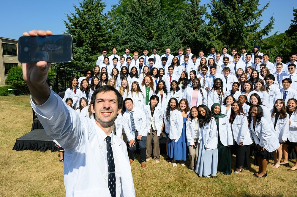 An incoming med student taking a selfie with his new classmates at the University of Rochester School of Medicine and Dentistry, following the White Coat Ceremony last Friday.