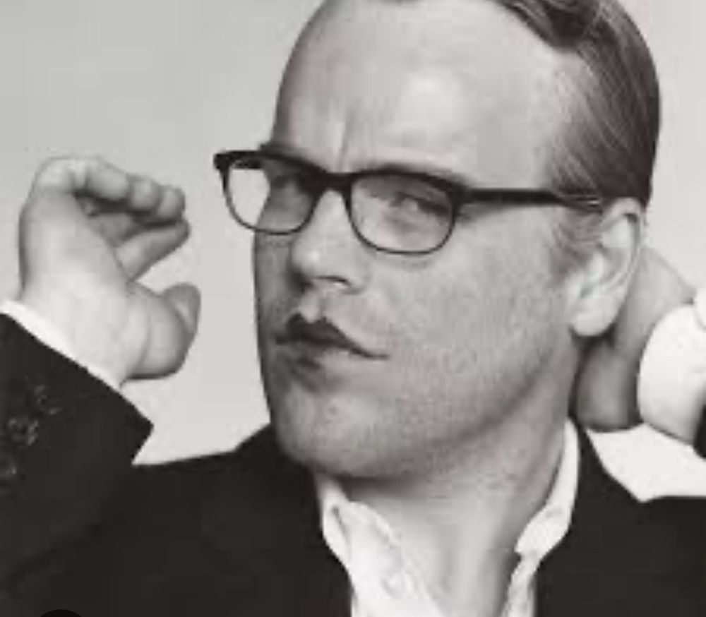 Herb Ritts put a little lipstick on Philip Seymour Hoffman for a photo shoot, and he is incredibly sexy in this black and white photo. The little black-framed glasses are pretty hot, too.