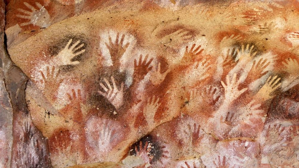 Rock art at Cueva de las Manos, Santa Cruz Province. From Wikipedia: "Cueva de las Manos (Spanish for Cave of the Hands or Cave of Hands) is a cave and complex of rock art sites in the province of Santa Cruz, Argentina, 163 km (101 mi) south of the town of Perito Moreno. It is named for the hundreds of paintings of hands stenciled, in multiple collages, on the rock walls."