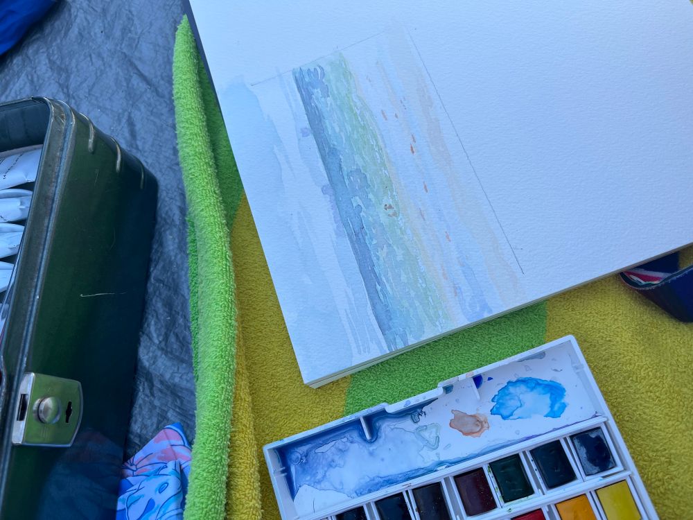 Watercolor painting in progress at the beach 